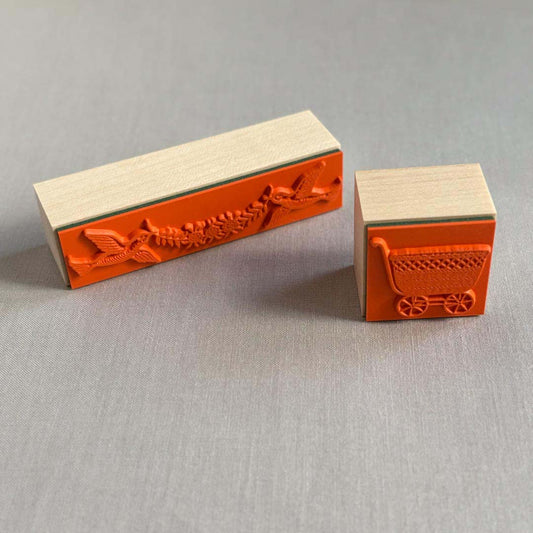 Flower carrying bird stamp