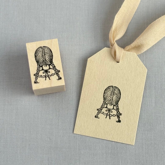 Stamp of the three-braided girl