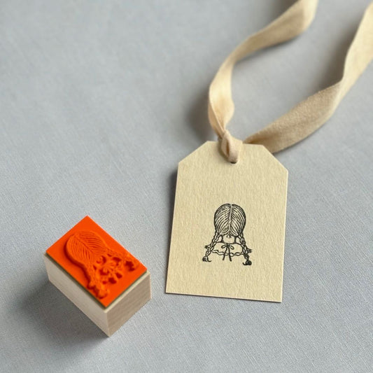 Stamp of the three-braided girl